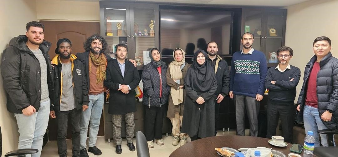 afriendly meeting between the director and deputy directors of the university's International Unit and representatives of international students